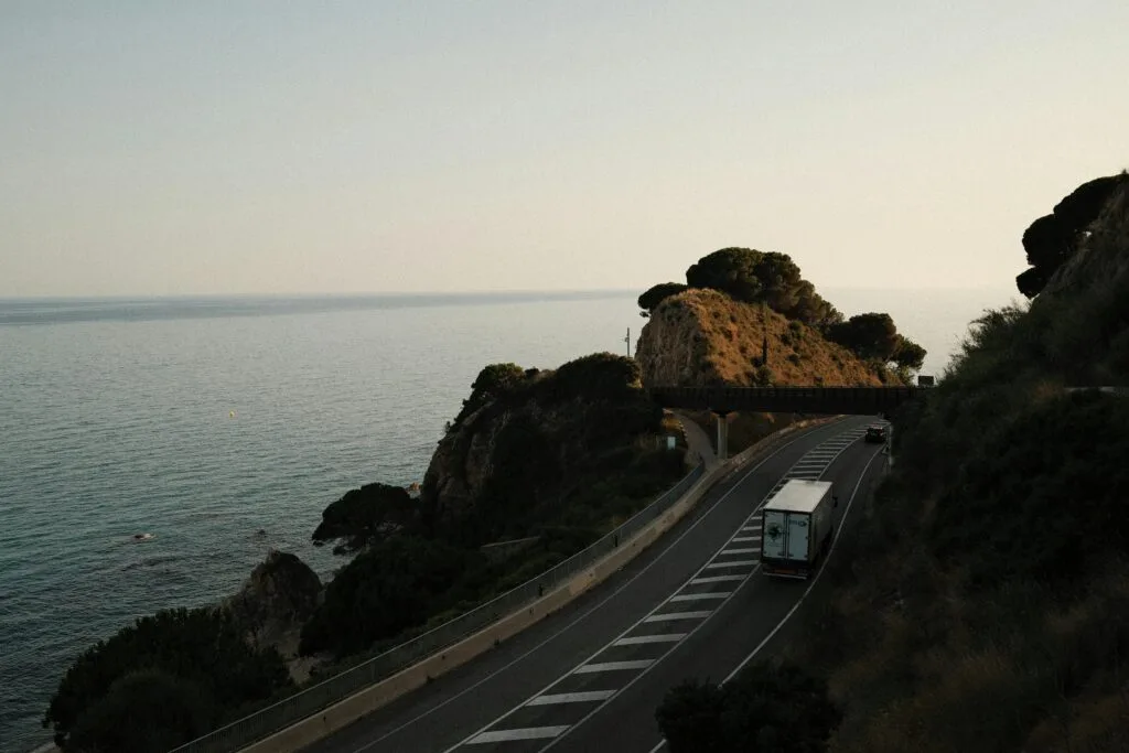 Scenic Coastal Road at Sunset with Ocean View